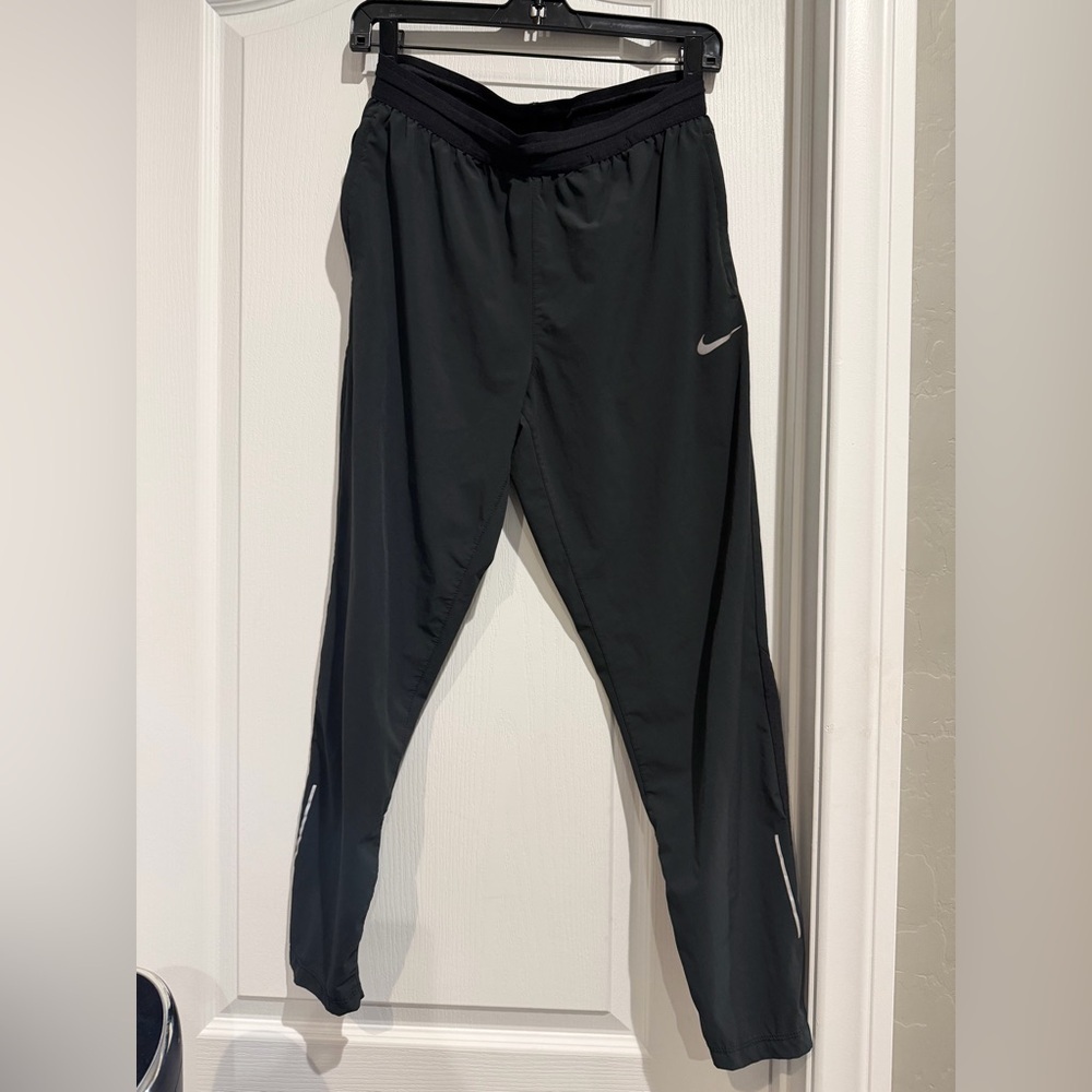 Nike Black and Gold Dri-FIT Athletic Top